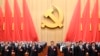 El presidente de China, Xi Jinping, al centro, en la ceremonia de apertura del 20mo Congreso Nacional del Partido Comunista chino, el domingo 16 de octubre de 2022.
