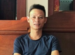 Bui Chung, who worked in Britain, is seen inside his house at Do Thanh commune, in Nghe An province, Vietnam October 30, 2019. (REUTERS/Cao Thanh)