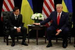 FILE - U.S. President Donald Trump speaks during a bilateral meeting with Ukraine's President Volodymyr Zelenskiy on the sidelines of the 74th session of the U.N. General Assembly in New York, Sept. 25, 2019.