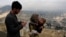FILE - A child receives polio vaccination drops during an anti-polio campaign in Kabul, Afghanistan.