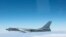 FILE - A Chinese military plane H-6 bomber flies through airspace between Okinawa prefecture's main island and the smaller Miyako island in southern Japan, photo taken Oct. 27, 2013.