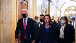 U.S. President Joe Biden arrives with Speaker of the House Nancy Pelosi, D-Calif., to meet with Democratic lawmakers at the U.S. Capitol to promote his bipartisan infrastructure bill on Capitol Hill in Washington, October 1, 2021.