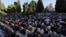 Palestinians pray in front of the Dome of the Rock shrine in Jerusalem, June 15, 2018 during the traditional morning prayer of the Muslim holiday of Eid al-Fitr.