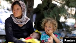 ژنێکی ئاواره‌ی ئیزه‌ده‌ی 