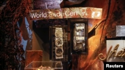 FILE - Artifacts are seen inside the National September 11 Memorial & Museum in New York May 14, 2014.