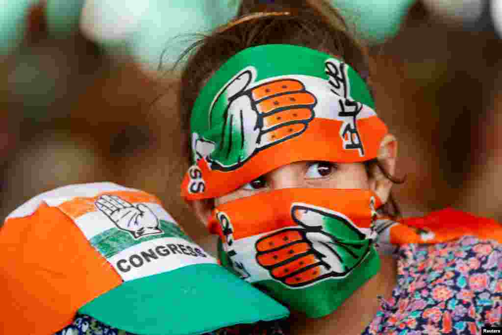 Supporters of the Congress party attend an election campaign rally of Rahul Gandhi, a senior leader of India's main opposition, the Congress party, ahead of the second phase of the assembly election, on the outskirts of Srinagar, India.
