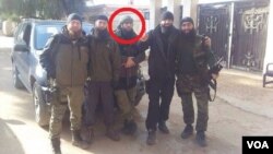 გიორგი მარგოშვილი (შუაში) თარხან ბათირაშვილთან (მარცხნიდან პირველი) და რუსლან მაჩალიკაშვილთან ერთად (მარცხნიდან მეოთხე) 2013 წელი, სირია