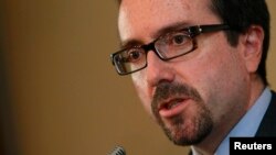 FILE - John Bass, U.S. ambassador to Turkey and formerly to Georgia, speaks during a news conference in Tbilisi, June 28, 2012. 