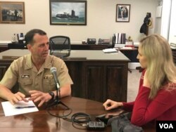 Admiral John Richardson and VOA reporter Carla Babb at the Pentagon.