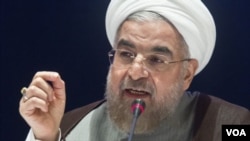 Members of the Kyrgyz special forces block a street during clashes between his supporters and law enforcement near the former president's residence in the village of Koy-Tash, some 20 kilometers from Bishkek.