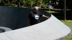 Cauline Yates, descendant of one of Thomas Jefferson's slave mistresses, looks over names inscribed in the walls of the Memorial to Enslaved Laborers at the University of Virginia in Charlottesville, Va., Thursday, May 6, 2021. (AP Photo/Steve Helber)