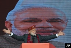 Indian Prime Minister Narendra Modi addresses a political gathering of his Bharatiya Janata Party, in Himachal Pradesh, in Dharmsala, Dec. 27, 2018.