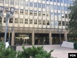 FILE - The Arlington Immigration Court building in Arlington, Virginia. The courtrooms inside are plain, and cases are dispatched quickly, each one settled in five to 10 minutes. (A. Barros/VOA)