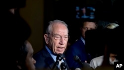 Senate Judiciary Committee Chairman Chuck Grassley, R-Iowa, speaks to reporters on Capitol Hill, Wednesday, Sept. 19, 2018, in Washington.