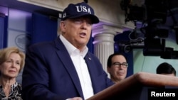 ប្រធានាធិបតី​សហរដ្ឋ​អាមេរិក លោក ដូណាល់ ត្រាំ ថ្លែង​ក្នុង​សន្និសីទ​សារព័ត៌មាន នៅ​សេត​វិមាន អំពី​ជំងឺ​កូរ៉ូណា​ កាល​ពី​ថ្ងៃ​ទី​១៤​ មីនា ២០២០។