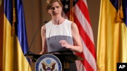 Philippine troops fire cannons to give President Rodrigo Duterte a 21-gun salute during the 121st anniversary celebration of the Philippine Army, in Taguig city, east of Manila.
