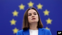 FILE - Exiled Belarusian opposition leader Sviatlana Tsikhanouskaya speaks at the European Parliament on Sept. 13, 2023, in Strasbourg, France. She is urging the EU to accept passports from "New Belarus" so exiled Belarusians don't have to return home to renew their documents.