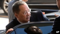 FILE - North Korean Foreign Minister Ri Yong Ho gets into a car at Beijing Capital International Airport in Beijing, China, Sept. 19, 2017.