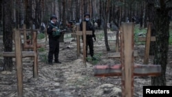 Mass grave discovered in Izium