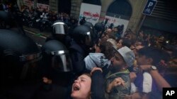 Фотогалерея: Сутички під час референдуму у Каталонії 