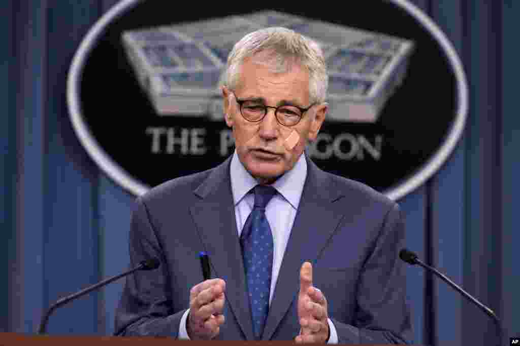 Defense Secretary Chuck Hagel speaks during a news conference at the Pentagon, Washington, Nov. 14, 2014.