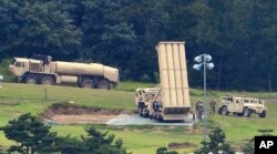 FILE - A U.S.-made Terminal High Altitude Area Defense, or THAAD, missile defense system is seen in Seongju, South Korea, Sept. 6, 2017. The system has been and remains a bone of contention between Beijing and Seoul.
