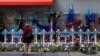 FILE - A woman looks at a makeshift memorial for the victims at Bourbon Street days after a U.S. Army veteran drove his truck into the crowded French Quarter on New Year's Day in New Orleans, Louisiana, Jan. 6, 2025. 
