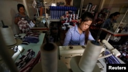 FILE: Women work in a clothes factory in Phnom Penh, Cambodia March 28, 2016. Picture taken March 28, 2016. REUTERS/Samrang Pring