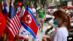 U.S and North Korean flags are on sale at a flag shop in Hanoi, Vietnam, Jan. 29, 2019. 
