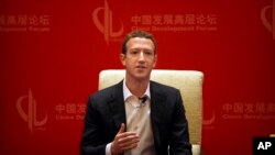 Facebook CEO Mark Zuckerberg speaks during a panel discussion held as part of the China Development Forum at the Diaoyutai State Guesthouse in Beijing, Saturday, March 19, 2016. 
