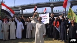 Irački demonstranti učestvuju u antivladinim protestima u gradu Nadžafu, 25. oktobra 2019.