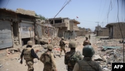 د کال ۲۰۱۴ په دې تصویر کې لیدل کېږي‌ چې پاکستاني عسکر د. عملیاتو وروسته د میران شاه په بازار کې ګزمه کوي 