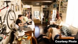 Students relax between classes in the on-campus housing at Rollins College in Winter Park, Florida.