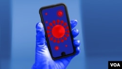 Mobilni telefon sa slikom koronavirusa