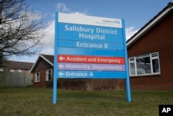 A entrance sign stands outside Salisbury Memorial Hospital where former Russian double agent Sergei Skripal and his daughter, Yulia, were taken after being found critically ill March 4, 2018, in Salisbury, England.