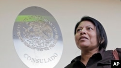 Illegal immigrant Divina Ciriaco, of Mexico, talks to a reporter, at the Mexican Consulate, March 3, 2017, in Miami.