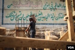 Building work continues in the densely packed camp of Bourj al Barajneh, but Palestinians are unable to own property in Lebanon. (J. Owens/VOA)