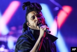 The Weeknd performs at the 2015 We Can Survive Concert at the Hollywood Bowl on Oct. 24, 2015, in Los Angeles.