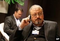 FILE - Saudi journalist Jamal Khashoggi at the World Economic Forum in Davos, Switzerland, Jan. 29, 2011. Khashoggi was a Saudi insider. He rubbed shoulders with the Saudi royal family and supported its efforts to nudge the entrenched ultraconservative cl