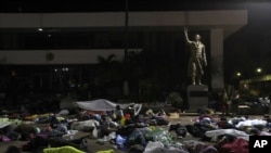 Los migrantes hondureños duermen en la ciudad de Tapachula, en el sur de México, el 22 de octubre de 2018. Foto: AP