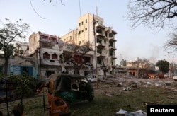 A general view shows the scene of a suicide car bombing outside Hotel Ambassador on Maka Al Mukaram Road in Somalia's capital Mogadishu, June 1, 2016.