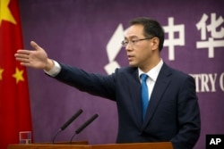 中國商務部發言人高峰在記者會上（2018年3月29日）