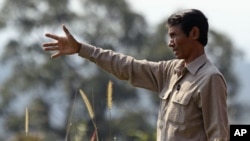 Chut Wutty, Director of the Natural Resource Protection Group, gestures at Botum Sakor National Park in Koh Kong province, Cambodia, February 2012. (file photo)