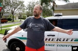 Eric Paddock, brother of Las Vegas gunman Stephen Paddock, speaks to members of the media near his home, Oct. 2, 2017, in Orlando, Fla.