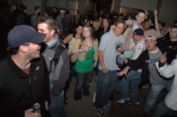 FILE: University of Connecticut students are shown drinking alcohol at a party just off the Storrs, Connecticut, University of Connecticut campus April 20, 2007.