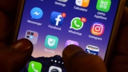 FILES - This photo taken on March 22, 2018 shows apps for WhatsApp, Facebook, Instagram and other social networks on a smartphone in Chennai.