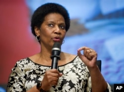 FILE - Phumzile Mlambo-Ngcuka, executive director of U.N. Women, speaks at World Bank headquarters, Washington, May 14, 2014.