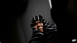 Libyan Tawergha woman is seen in a refugee camp at the outskirts of Benghazi, Libya, March 7, 2012.