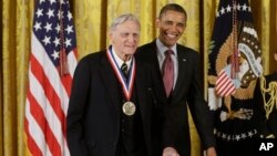 President Barack Obama awards the National Medal of Science to Dr. John Goodenough of the University of Texas, Friday, Feb. 1, 2013, during a ceremony in the East Room of the White House in Washington.