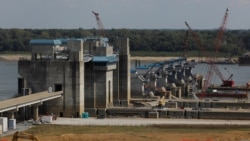 FILE - Construction of the new Olmsted Locks and Dam continues on the Ohio River in Olmsted, Illinois, Sept. 19, 2017.
